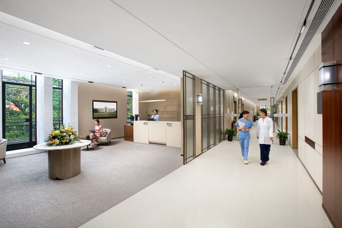 Illustration of a clinical team walking through a hospital corridor